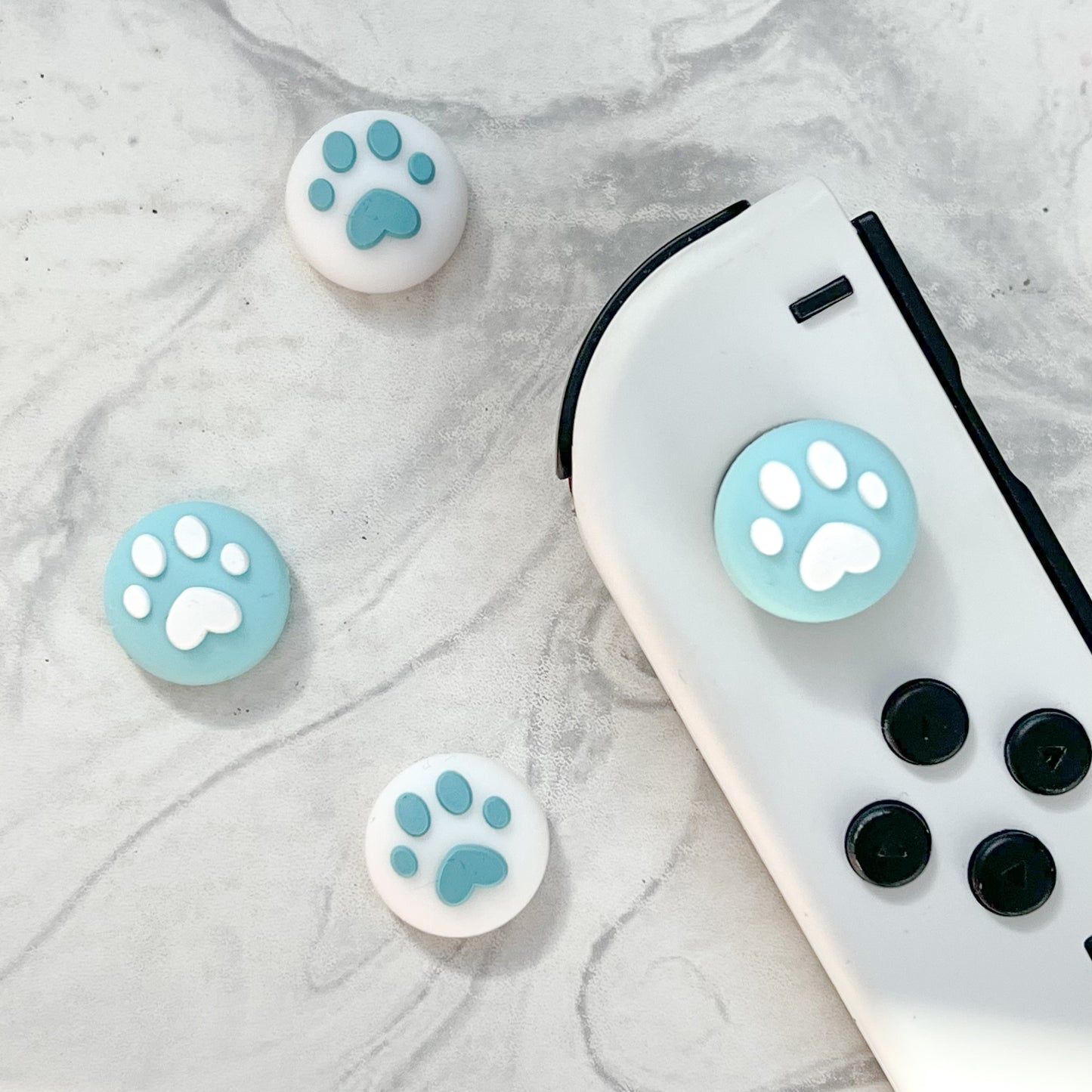 Pastel Blue Paw Thumb Grips